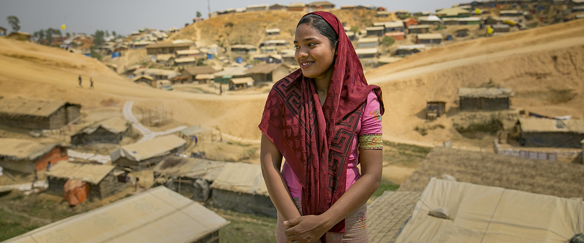 Senu Ara, 17, stands outside the Women's Centre in Balukhali camp March 6, 2018. She arrived in Cox’s Bazar the same way as many other Rohingya refugees: On foot. Photo: UN Women/Allison Joyce