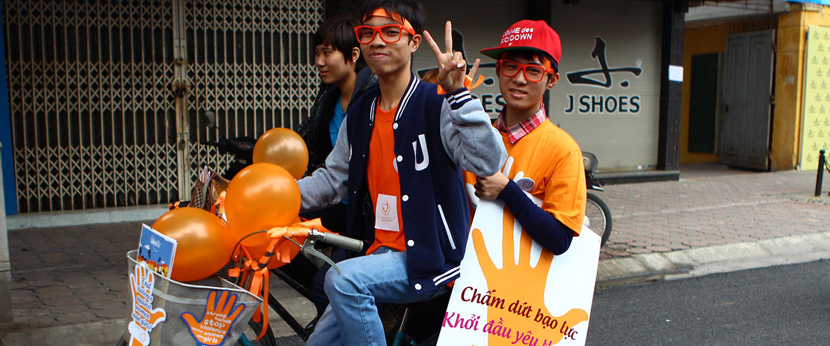 In Viet Nam, UN Women mobilized thousands of people to dress in orange and participate in #16days of Activism. Young students participated in a bicycle ride to raise awareness about ending violence against women under the slogan "End violence - Start love - Stop violence against women and girls". Photo: UN Women/Thao Hoang