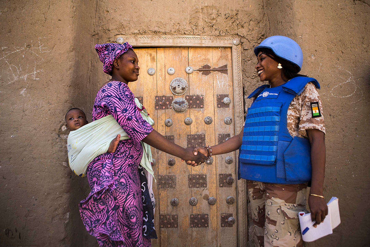 United Nations Police (UNPOL) officer from Niger on patrol in Timbuktu, Mali, working to secure the city against threats of terrorism and banditry. Photo: UN Photo/Harandane Dicko.