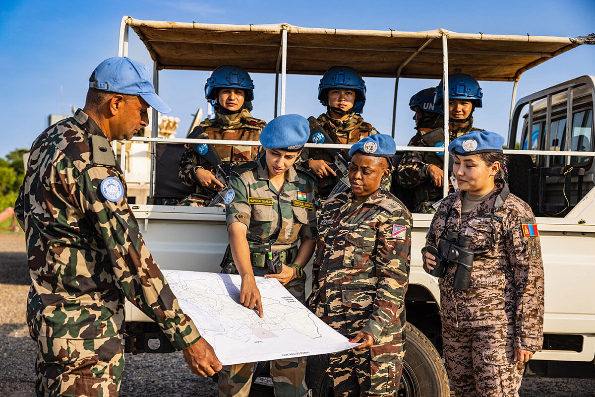 UNMISS peacekeepers from Mongolia, India, and Namibia, respectively, photographed at mission headquarters in Juba, South Sudan. Photo: UNMISS/Gregorio Cunha.