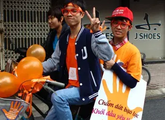 In Viet Nam, UN Women mobilized thousands of people to dress in orange and participate in #16days of Activism. Young students participated in a bicycle ride to raise awareness about ending violence against women under the slogan "End violence - Start love - Stop violence against women and girls". Photo: UN Women/Thao Hoang