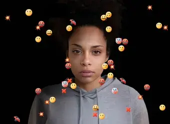 16 Days of Activism 2025 campaign image. In the photo a woman looks at the camera surrounded by hateful emojis. Photo: UN Women. 
