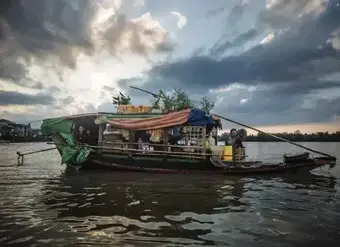 migrants on a floating house