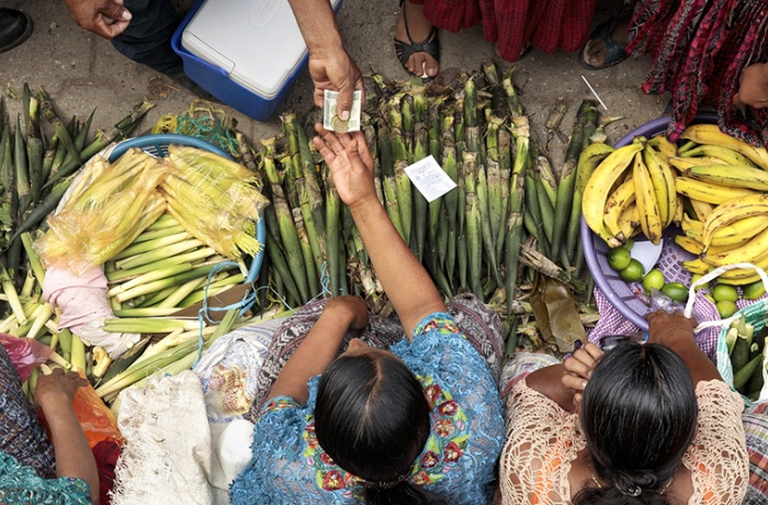 Scenes from the municipal market in Tucuru, Guatemala, where women sell their products. Photo: UN Women/Ryan Brown