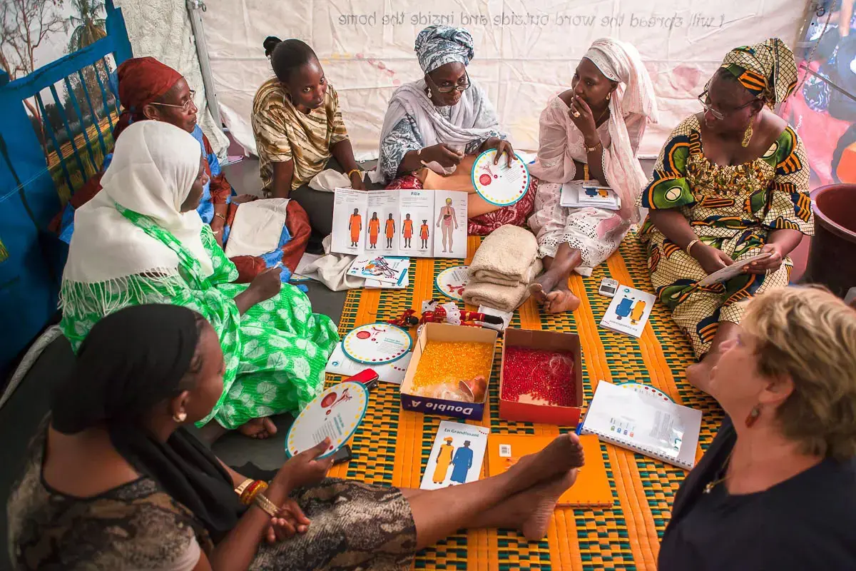 In 2014 in Senegal, government professionals participate in a training of trainers workshop on menstrual hygiene management delivered by a Joint Programme on Gender, Hygiene and Sanitation and designed and implemented by the Water Supply and Sanitation Collaborative Council (WSSCC) and UN Women in West and Central Africa.